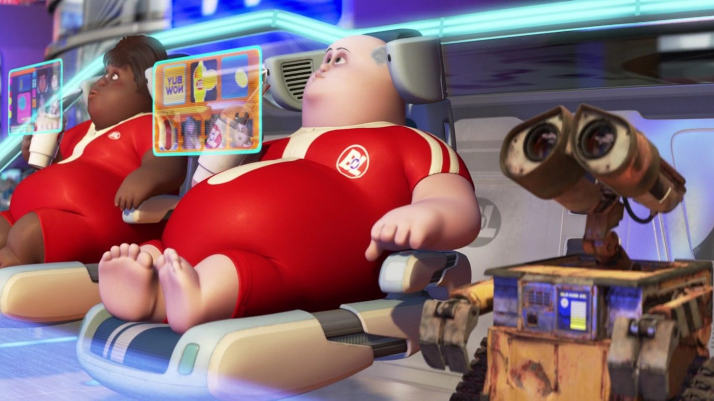 a still from Wall-E of humans watching screens